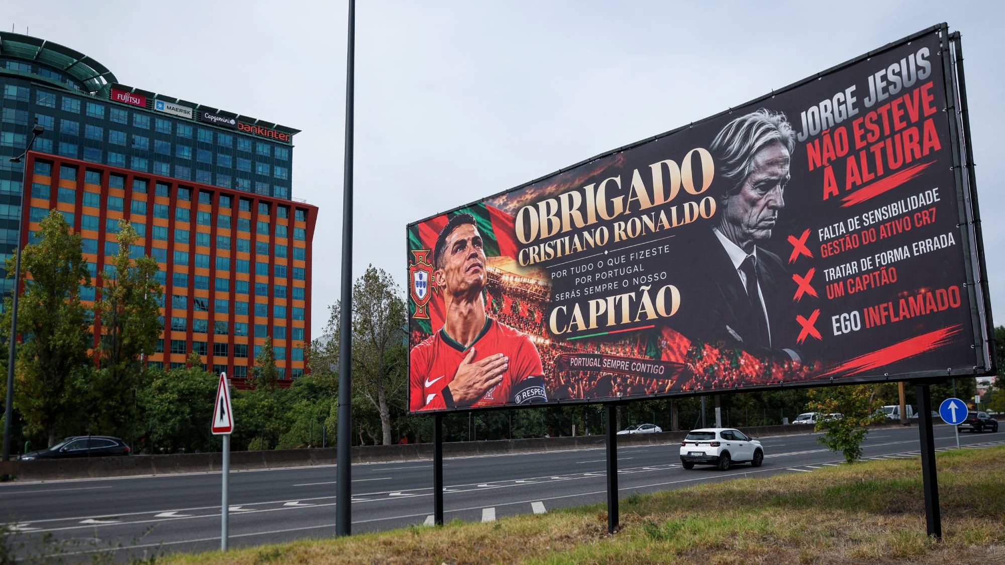A billboard in support of Portugal’s forward Cristiano Ronaldo reading “Thank you Cristiano Ronaldo for all that you did for Portugal. You will be always our captain” mixed with an adjacent message critical against Portugal’s coach Jorge Jesus reading “Jorge Jesus was not up to the job" and “lack of sensitivity in managing the CR7 asset”, the fact that he “mishandled a captain” is pictured near Luz stadium in Lisbon on October 2, 2026.