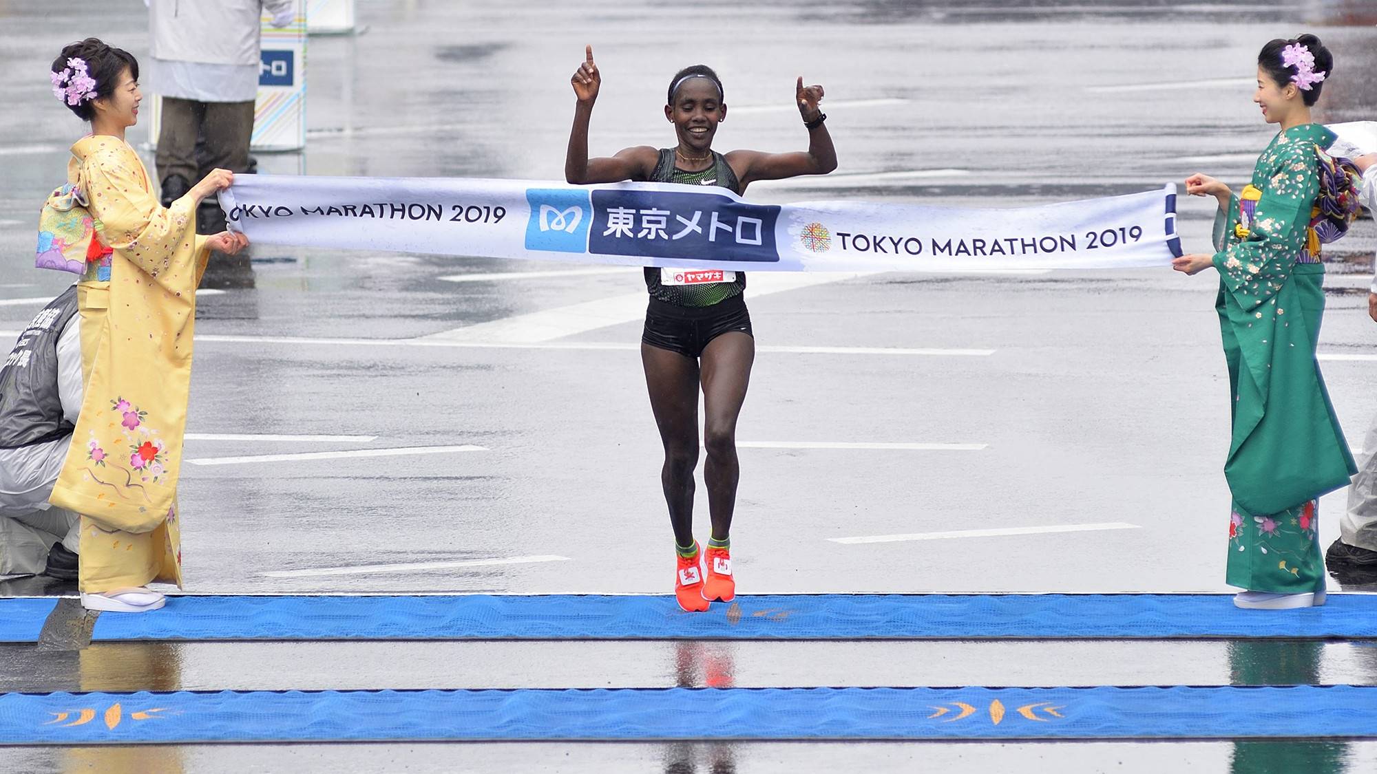 TOKYO, JAPAN - MARCH 03 : Ruti Aga (ETH) finishes at the 1st place of the Women Elite of the 13th Tokyo Marathon in Tokyo, Japan on Sunday 3rd March 2019. David MAREUIL / Anadolu Agency