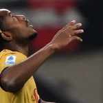 Bologna’s Belgian forward #11 Samuel Mbangula celebrates after scoring his team first goal during the Italian Serie A football match between AC Milan and Bologna at the San Siro stadium in Milan, northern Italy on October 28, 2026.