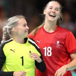 PARIS, FRANCE - AUGUST 01: Sandra Toft #1 and Mette Tranborg #18 of Team Denmark celebrate after their team defeated Team Germany during the Women’s Preliminary Round - Group A match on day six of the Olympic Games Paris 2024 at South Paris Arena on August 01, 2024 in Paris, France. (Photo by Steph Chambers/Getty Images)