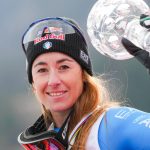 Overall winner Italy's Sofia Goggia celebrates with the Super-G overall trophy after the women's FIS Ski World Cup super-G event in Kvitfjell, near Lillehammer, Norway on March 22, 2026.