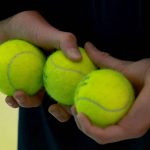 A photo shows a ball boy with tennis balls. Grigor Dimitrov of Bulgaria plays against Matteo Berrettini of Italy during the men's singles third round match on day six of the 2026 Wimbledon Championships at All England Lawn Tennis and Croquet Club in London, on July 4, 2026. ( The Yomiuri Shimbun )