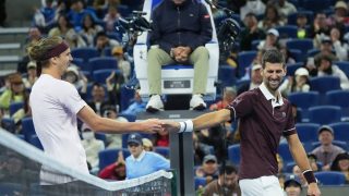 (261004) -- BEIJING, Oct. 4, 2026 (Xinhua) -- Alexander Zverev (L) greets with Novak Djokovic after the men's singles quarterfinal match between Alexander Zverev of Germany and Novak Djokovic of Serbia at 2026 China Open tennis tournament in Beijing, China, Oct. 4, 2026. (Xinhua/Ju Huanzong)