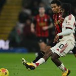 Liverpool's Dutch defender #30 Jeremie Frimpong vies with Bournemouth's Morrocan midfielder #21 Amine Adli during the English Premier League football match between Bournemouth and Liverpool at the Vitality Stadium in Bournemouth, southern England on January 24, 2026.