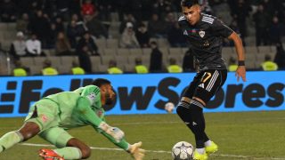 Qarabag's forward Camilo Duran scores past Frankfurt's Brazilian goalkeeper #40 Kaua Santos during the UEFA Champions League league phase football match between Qarabag and Frankfurt at the Tofiq Bahramov Republican Stadium in Baku on January 21, 2026.