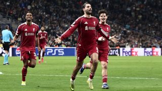 Liverpool's Hungarian midfielder #08 Dominik Szoboszlai (C) celebrates scoring his team's first goal during the UEFA Champions League, league phase day 7, football match between Olympique de Marseille (OM) and Liverpool FC at the Stade Velodrome in Marseille, southern France, on January 21, 2026.