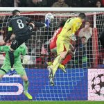 LISBON, PORTUGAL - JANUARY 28: Anatoliy Trubin of SL Benfica celebrates and scores a goal in the last minute of the game during the UEFA Champions League 2025/26 League Phase MD8 match between SL Benfica and Real Madrid C.F. at Estadio da Luz on January 28, 2026 in Lisbon, Portugal. Zed Jameson / Anadolu