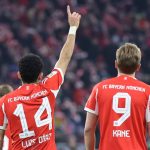 Bayern Munich's Colombian forward #14 Luis Diaz (L) celebrates with Bayern Munich's English forward #09 Harry Kane the 4-1 during the German first division Bundesliga football match between FC Bayern Munich and TSG 1899 Hoffenheim in Munich, southern Germany on February 8, 2026.