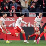 Girona's Spanish midfielder #08 Fran Beltran (C) celebrates scoring his team's second goal during the Spanish league football match between Girona FC and FC Barcelona at Montilivi Stadium in Girona on February 16, 2026.