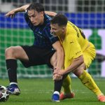 Francesco Pio Esposito of F.C. Inter and Jostein Gundersen of FK Bodo Glimt are in action during the UEFA Champions League 2025/26 League Knockout Play-off Second Leg match between F.C. Inter and FK Bodo/Glimt at the San Siro Stadium in Milan, Italy, on February 24, 2026. (Photo by Domenico Cippitelli/NurPhoto)
