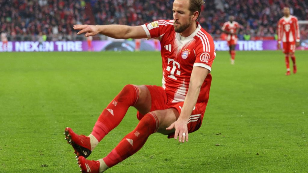 Bayern Munich's English forward #09 Harry Kane celebrates scoring the 3-0 goal during the German first division Bundesliga football match between FC Bayern Munich and Eintracht Frankfurt in Munich, southern Germany, on February 21, 2026.