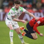 Ireland's midfielder #11 Robert Brady and Czech Republic's midfielder #09 Adam Karabec vie for the ball during the FIFA World Cup 2026 European qualification semi final football match Czech Republic vs Ireland on March 26, 2026 in Prague.