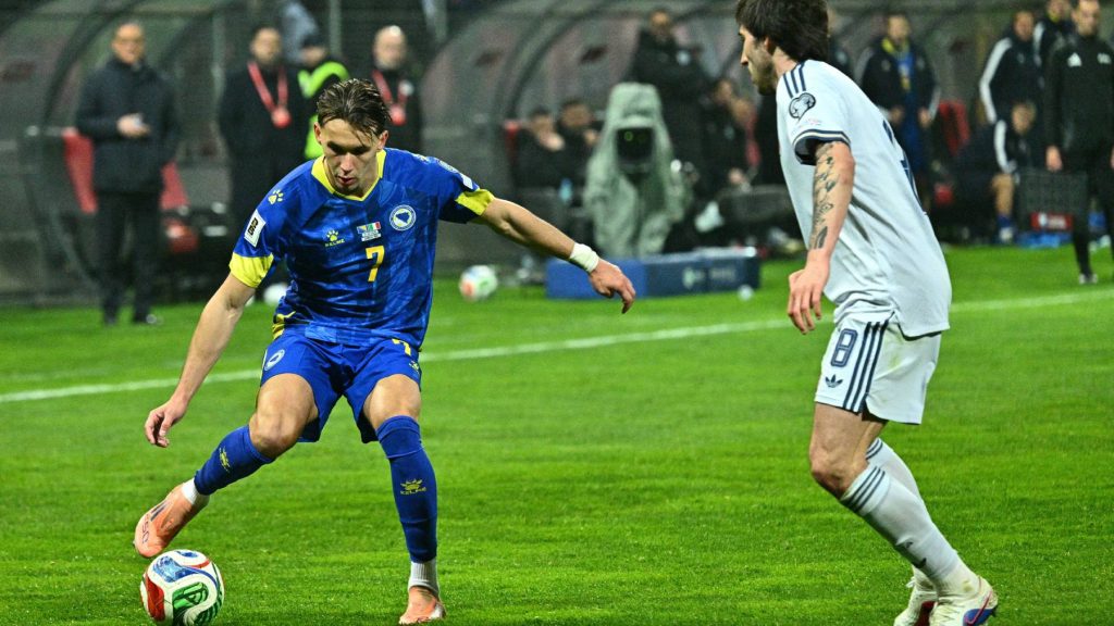 Bosnia-Herzegovina's defender #07 Amar Dedic (L) fights for the ball with Italy's midfielder #08 Sandro Tonali during the FIFA World Cup 2026 European qualification final football match between Bosnia-Herzegovina and Italy at the Bilino-Polje stadium in Zenica on March 31, 2026.