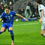 Bosnia-Herzegovina's defender #07 Amar Dedic (L) fights for the ball with Italy's midfielder #08 Sandro Tonali during the FIFA World Cup 2026 European qualification final football match between Bosnia-Herzegovina and Italy at the Bilino-Polje stadium in Zenica on March 31, 2026.