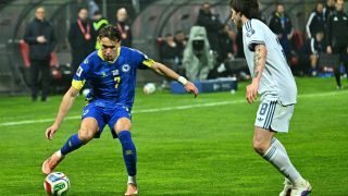 Bosnia-Herzegovina's defender #07 Amar Dedic (L) fights for the ball with Italy's midfielder #08 Sandro Tonali during the FIFA World Cup 2026 European qualification final football match between Bosnia-Herzegovina and Italy at the Bilino-Polje stadium in Zenica on March 31, 2026.