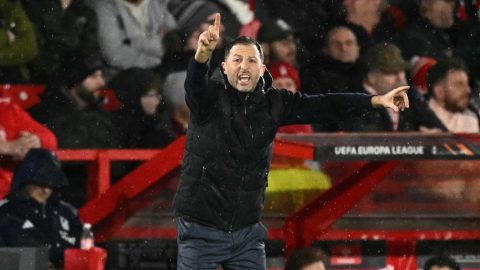Fenerbahce's Italian-German coach Domenico Tedesco shouts instructions to the players from the touchline during the UEFA Europa League Knockout Round Play-off second-leg football match between Nottingham Forest and Fenerbahce SK at The City Ground in Nottingham, central England, on February 26, 2026.