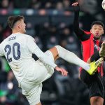 Midtjylland's Colombian midfielder #19 Pedro Bravo (R) and Nottingham Forest's Italian forward #20 Lorenzo Lucca vie for the ball during the UEFA Europa League football match, last 16 second leg, between FC Midtjylland and Nottingham Forest in Herning, Denmark on March 19, 2026.