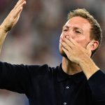 Germany's head coach Julian Nagelsmann gestures to fans at the end of the UEFA Euro 2024 round of 16 football match between Germany and Denmark at the BVB Stadion Dortmund in Dortmund on June 29, 2024.