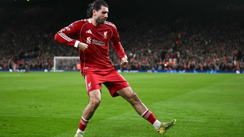 Liverpool's Hungarian midfielder #08 Dominik Szoboszlai celebrates scoring his team's first goal during the UEFA Champions League, round of 16 second leg football match between Liverpool and Galatasaray at Anfield in Liverpool, north-west England on March 18, 2026.